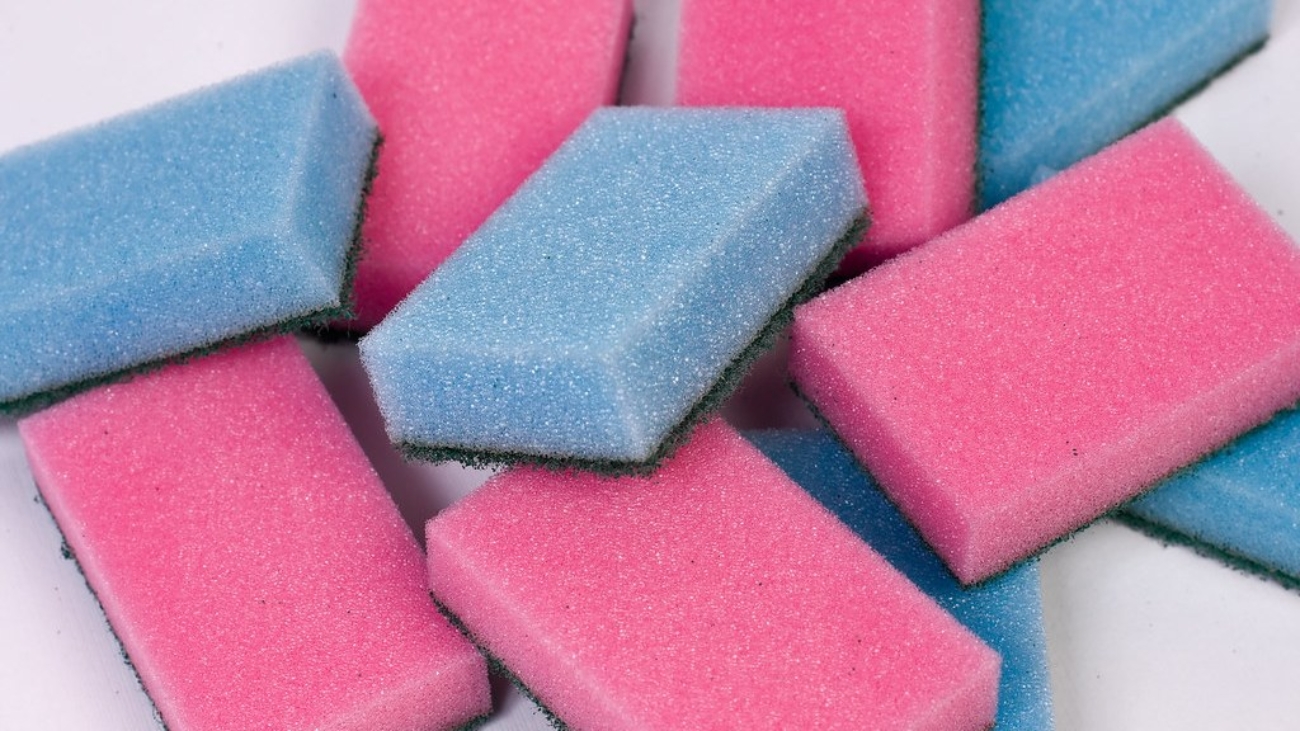 Plain blue and pink polyurethane kitchen sponges